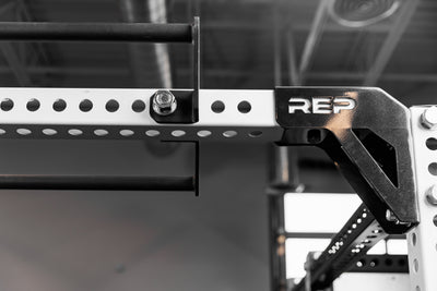 Close-up of the REP Fitness Crossmember Pull-Up Bar on an 82 inch crossmember