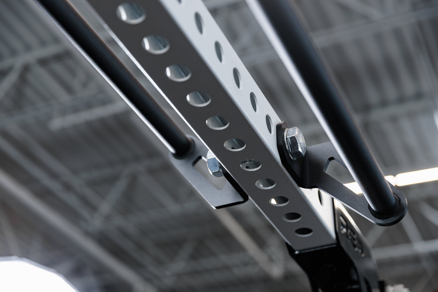 Crossmember Pull-Up Bars mounted to the front and the back of an 82 inch crossmember