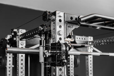 Close-up shot of the Crossmember Multi-Grip Pull-Up Bar on the front of a PR-5000 rack