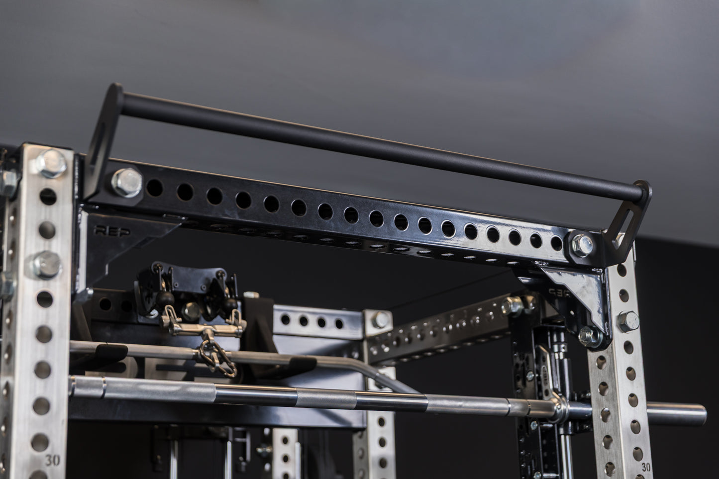 The REP Fitness Crossmember Pull-Up Bar on the front of a PR-5000 rack