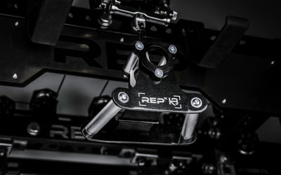 REP® x Kleva Built® Angled Atlas™ Close-Grip Cable and Landmine Attachment on the lat pulldown cable on an Ares™ 2.0