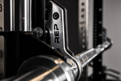 Close-up of the REP Fitness Smith Machine branding